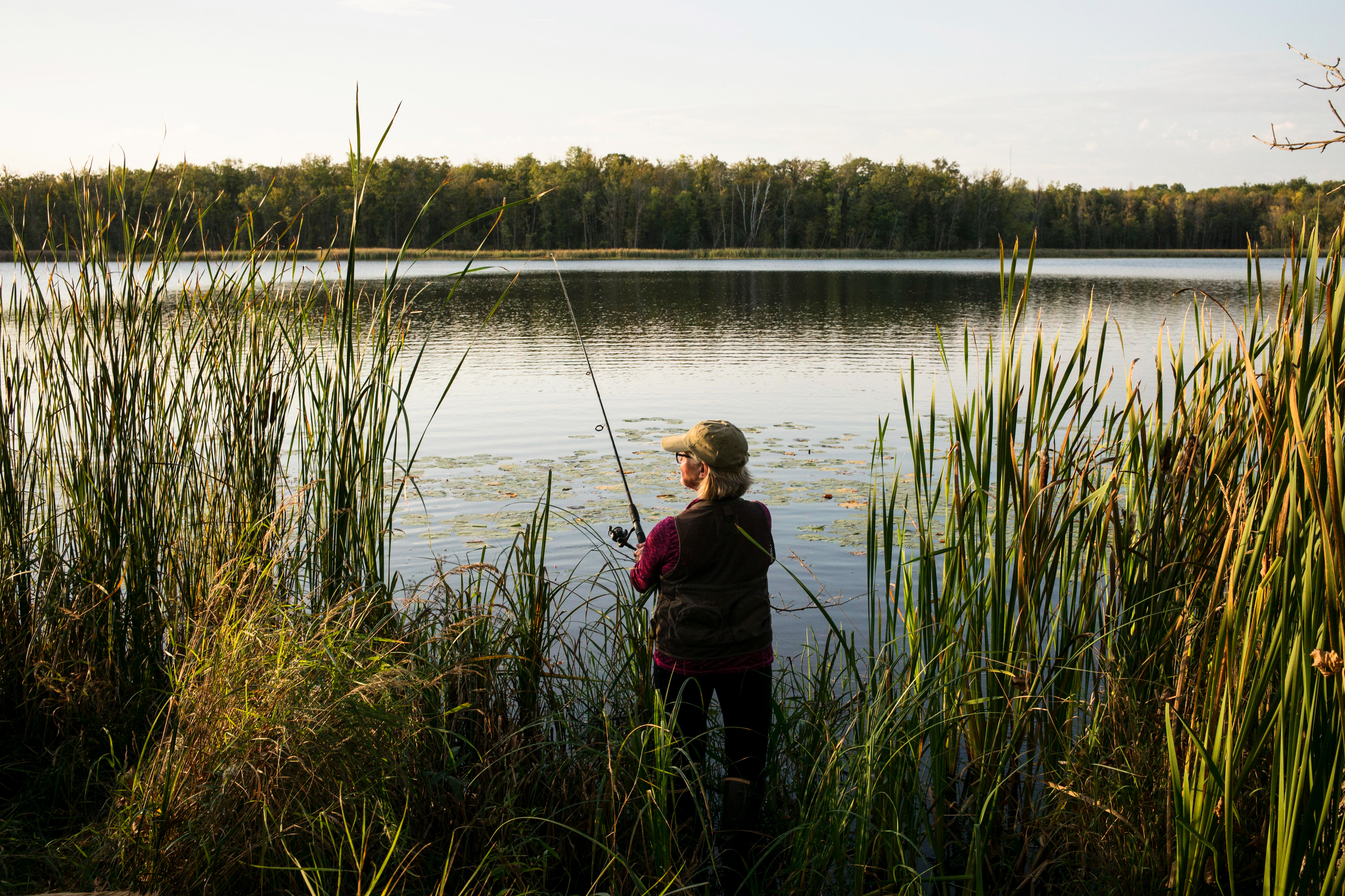 Visitor fishing at Indian Jack Lake WMA in the Brainerd Lakes area.